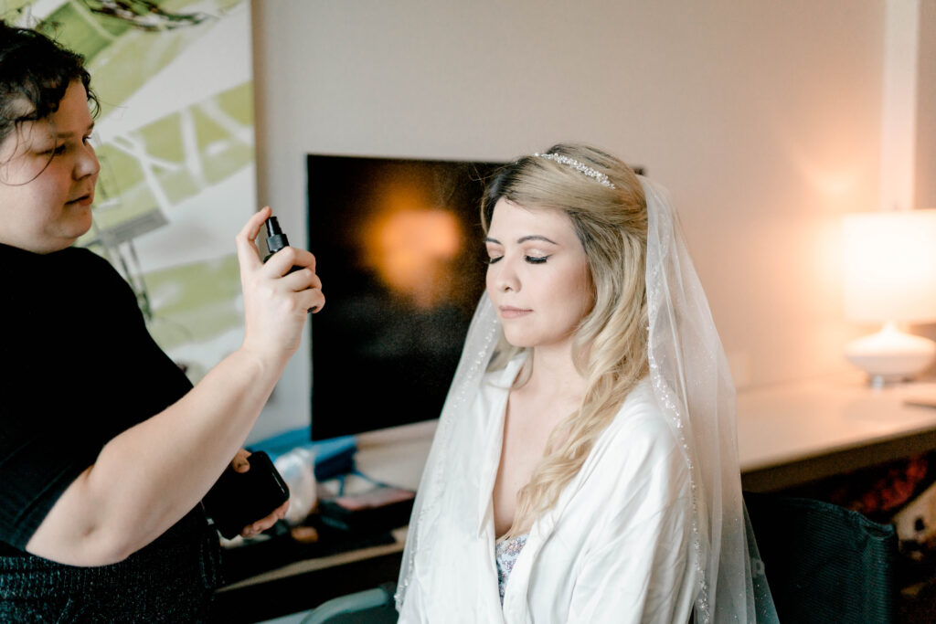 Bride getting makeup